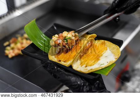 Hands Cooking Tacos In A Mexican Restaurant