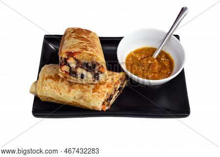 Mexican Burrito With Chicken, Cheese, Beans,rice Served With Sauce Borracha
