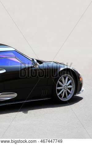 Kiev, Ukraine - June 19, 2021: Spyker C8 Laviolette. Black Luxury Supercar Spyker On The Road