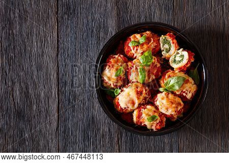 Chicken Rollatini With Spinach Ricotta Filling In Marinara Sauce Topped With Mozzarella Cheese And F