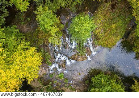 Top View From Drone Of Beauty Waterfall Between Trees In Autumn