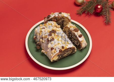 Christmas Strudel With Poppy Seeds, Traditional Polish Festive Cake Makowiec On Green Plate, Covered