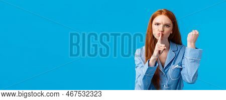 Shut Up Or Else. Angry And Displeased Redhead Girl Threaten Roommate Be Quiet And Shaking Fist, Warn