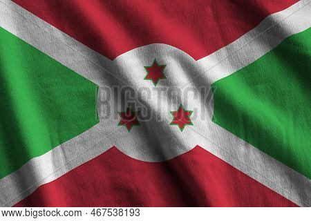 Burundi Flag With Big Folds Waving Close Up Under The Studio Light Indoors. The Official Symbols And