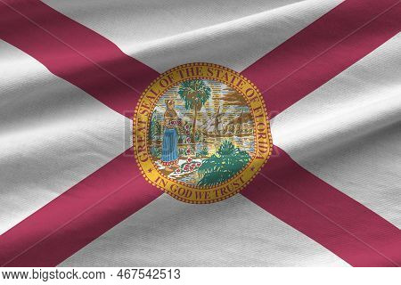 Florida Us State Flag With Big Folds Waving Close Up Under The Studio Light Indoors. The Official Sy