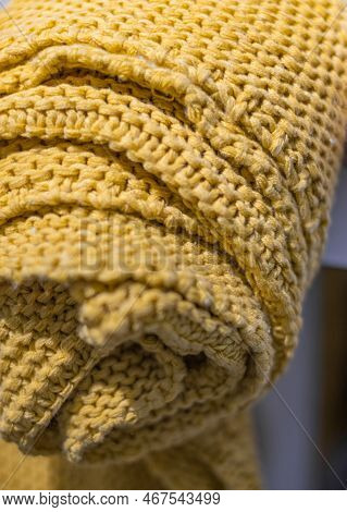 Beige Yellow Chunky Knit Blanket Texture. Hand Knitted Merino Wool Chunky Blanket In Interior Stylis