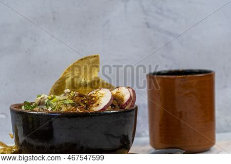 Meat In Its Juice With Golden Tortilla, Toasted, Prepared With Radishes And Sauces