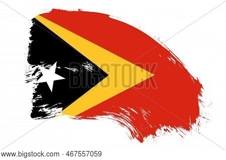 East Timor Flag On White Background With Abstract Paint Brush Texture Effect