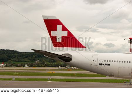 Zurich, Switzerland, September 27, 2022 Swiss Cross Symbol On The Rudder Of An Airbus A340-313 Aircr