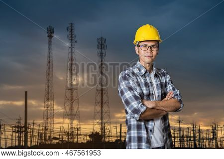Asian Engineer Man Entrepreneur Constrcution Industry. Male Engineer Crossed Arms Working At Electri