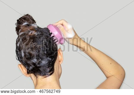 Hair Growth Stimulating, Scalp Massage.woman Using  Pink Scalp Massager Shampoo Brush With Silicone,