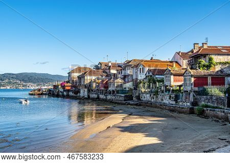 Fishing Village Of Combarro With The Typical Granary Horreos. Galicia In Spain.