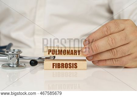 Medical Concept. On A White Surface, A Stethoscope And Wooden Plates With The Inscription - Pulmonar