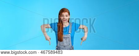 Curious Tender Lovely Ginger Caucasian Girl, Pointing Down Questioned, Check Out Interesting Promo, 