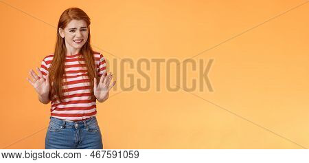 Reluctant Bothered Cute Redhead Girl Apologizing Make Stop Refusal Sign, Hold Hands Block, Grimacing