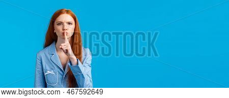 Quiet Please Im Trying Sleep. Displeased And Disturbed Young Redhead College Girl Living Dormitory A