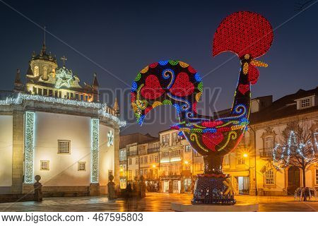 Barcelos, Portugal - Circa Jauary 2019: View At The Pop Galo At Night, Public Art Inspired In The Ba