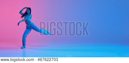Young Girl Dancing Hip-hop Over Gradient Pink Blue Background In Neon Light. Flyer
