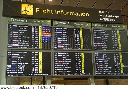 Singapore- 2 Dec, 2022: Flight Connection Information Board Seen In Terminal 2 At Singapore Changi A