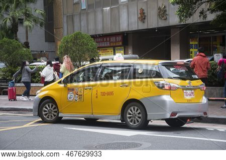 Taipei, Taiwan- 10 Dec, 2022: Taxi On The Streets Of Taipei, Taiwan. Taxi Fare Is Based On The Meter