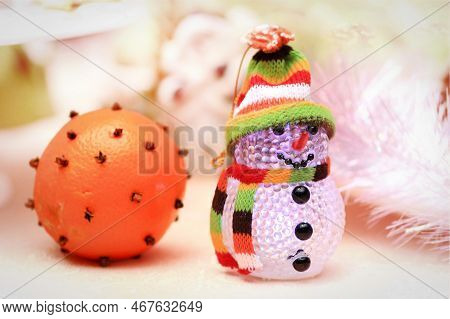 Beautiful Snowman And Festively Decorated Orange Christmas Background