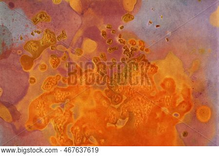 Abstract Pink And Orange Lumen Print Texture Background. An Image Created On Photographic Paper.