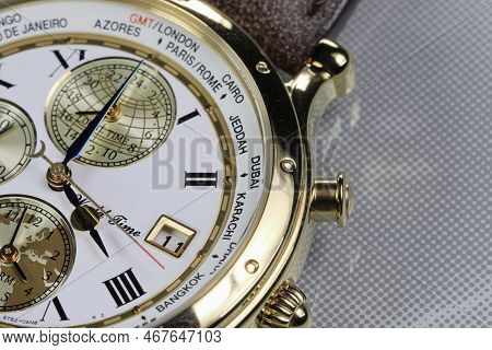 Close Up Shallow Focus Time Zone Cities Code On Luxury World Time Watch Bezel On Bangkok Time.