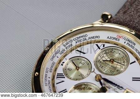Close Up On Time Zone Cities Name On Luxury World Time Watch Bezel.