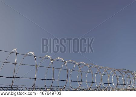 Barbwire Prison Wall With Barbed Wire Fence Coiled Razor Wire Perimeter Fence, Barbwire.