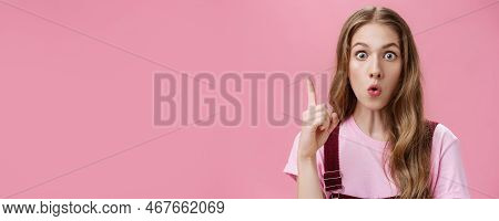 Close-up Shot Of Creative Emotive Young Cute Female Student With Beautiful Natural Wavy Hair Raising
