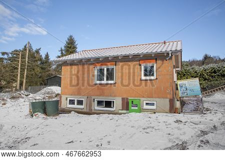 Fischbach, Germany- February 11, 2021: Construction Of A New Built House In Winter Landscape.