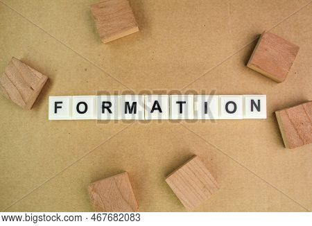 Letters Of The Alphabet With The Word Formation. The Concept Of Formation Or Something Formed