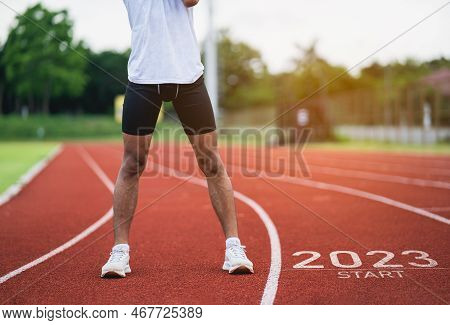 Sport Man Runner Stretching At Running Track Start Into The New Year 2023. Start Up Of Runner Man Ru