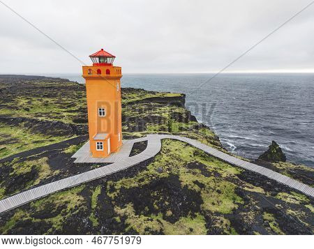 Scenic Lighthouse At The Edge Of The Cliff, Svortuloft Lighthouse, Lava Landscape
