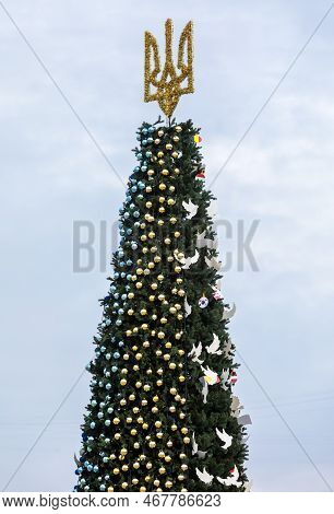 Kyiv, Ukraine - Dec. 22, 2022: The Christmas Tree On Sofiyivska Square Is Being Decorated With Blue 