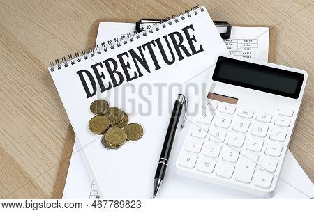Debenture Text With Chart And Calculator And Coins , Business