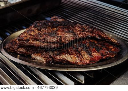 A Roasted Beef On The Grill But Overcooked