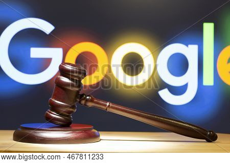 Syktyvkar, Komi, Russia,december 24, 2022,google. A Hammer On The Table Against The Background Of Th