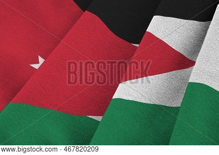 Jordan Flag With Big Folds Waving Close Up Under The Studio Light Indoors. The Official Symbols And 
