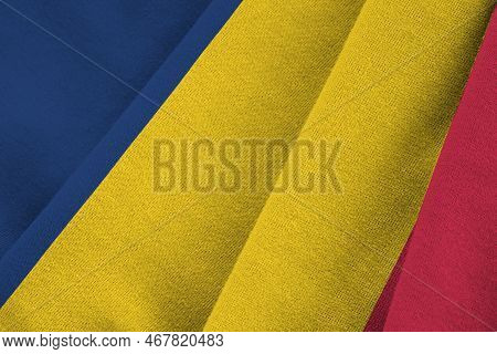 Chad Flag With Big Folds Waving Close Up Under The Studio Light Indoors. The Official Symbols And Co