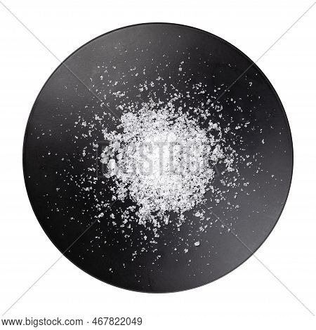 Sea Salt, Fleur De Sel, In A Flat Black Bowl. Also Known As Flor De Sal, A Salt That Forms A Thin, D