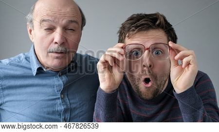 Surprised Stupefied Men Mature Father And Son In Big Glasses With Wow Expression