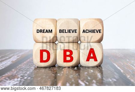 Hand Of A Business Man Completing The Puzzle With The Last Missing Piece.concept Image Of Business A