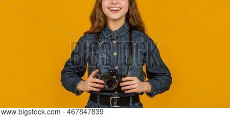 Camera Hanging From Neck Of Happy Child Photographer Crop View Yellow Background