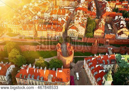 Old City In Warsaw With Red Roofs, Poland From Above. Travel Outdoor European Background With Wall A