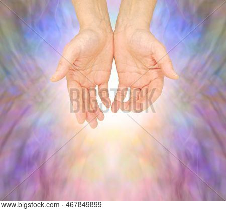 Reiki Therapist Lightworker Offering You Healing - Female Open Palm Hands With Against A Multicolour