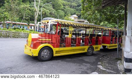 Yogyakarta, Indonesia - September 5, 2022: The Small Train Called Odong-odong Is Colored Red And Sur
