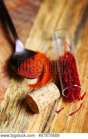 Selective Focus. Macro. Saffron. Dried Saffron Petals In A Glass Flask.