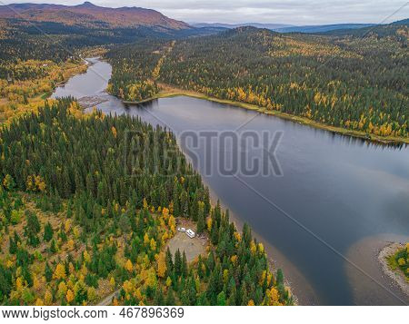 Aerial View Camping Caravan Near River Autumn Fall Landscape Along Ammarnas National Park In Lapland