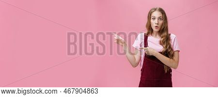Excited Stunned And Surprised Charming Young Girl With Makeup And Curvy Hairstyle In Trendy Corduroy